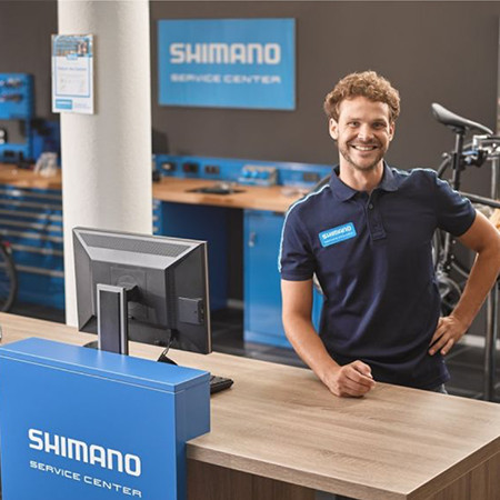 Shimano employee greeting visitors