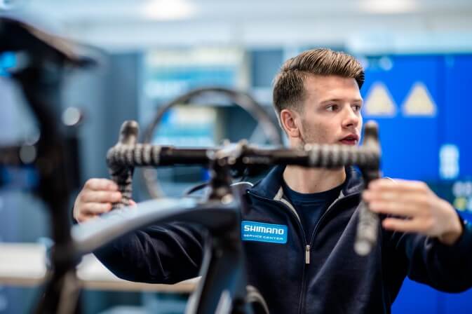 Mechanic working on brakes